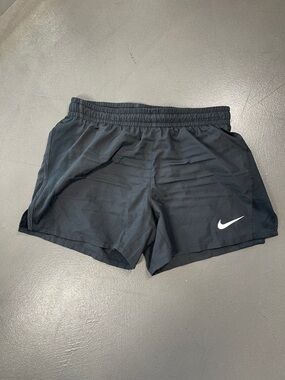 Nike Black Athletic Shorts with White Swoosh Boys Large 4” inseam